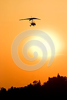 Microlight at sunset