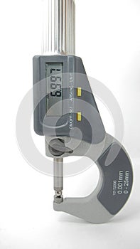 A  micrometer with a digital display,Located on white background,Easy to use in any work