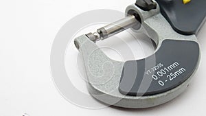 A  micrometer with a digital display,Located on white background,Easy to use in any work