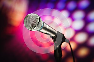 Microphone against purple background