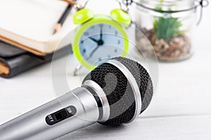 Microphone and alarm clock photo