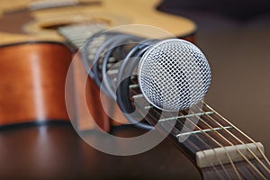 Microphone attached to the guitar neck.