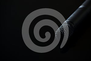 Microphone on black background. Close up