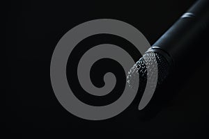 Microphone on black background. Close up