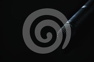 Microphone on black background. Close up