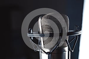 Microphone on black background