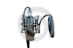 Microphone close - up on the background of a professional recording Studio, isolated on a white background. Microphone stand for