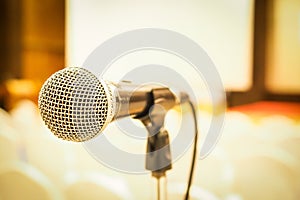 Microphone in concert hall or conference room . Left side