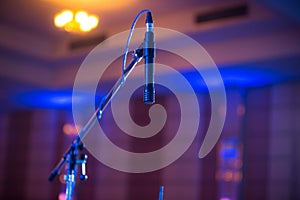 Microphone in concert hall conference room soft and blur style