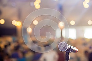 Microphone in concert hall or conference room soft and blur style for background.