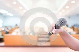 Microphone in conference on seminar room background