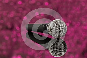 Microphone in defocus pink background