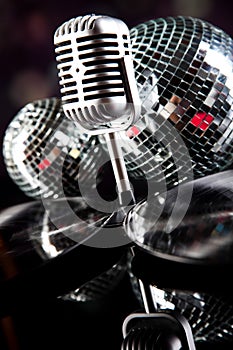 Microphone with disco balls, music saturated concept