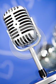 Microphone with disco balls, music saturated concept
