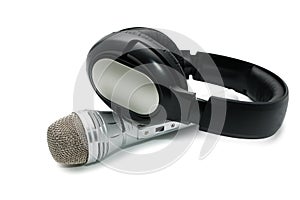 Microphone and ear-phones on a white