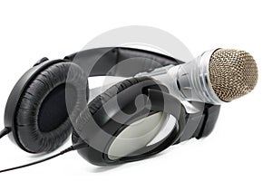 Microphone and ear-phones on a white