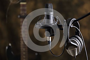 Microphone, earphones and electric guitar