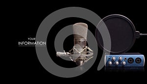 Microphone external audio card on a black background