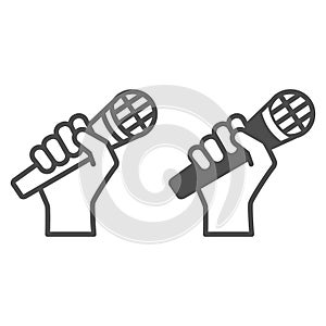 Microphone in hand line and solid icon, sound design concept, hand holding mic vector sign on white background, outline