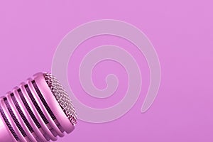 Microphone head. Purple, lilac background.Toning image.Ð¡oncept audio recording, karaoke