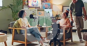 Microphone, interview and women in living room for social media, discussion or live streaming talk show. Podcast