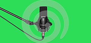 Microphone isolated on green background. Condencer Mic