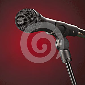 Microphone Isolated On Red Background