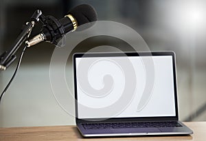 Microphone, laptop mockup and screen with audio, radio or podcast equipment with technology and show marketing