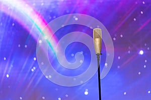 Microphone with led ighting background in concert hall