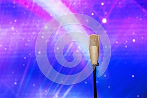 Microphone with led ighting background in concert hall