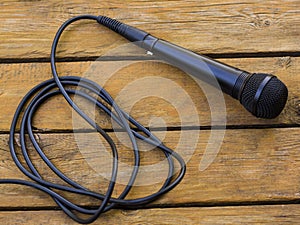 Microphone lying on a wooden table