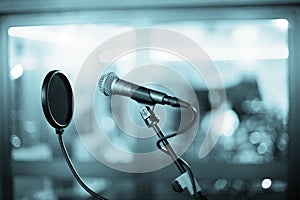 Microphone and pop shield in recording studio