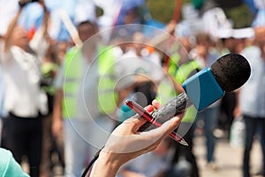 Microphone. Public demonstration.