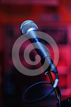 Microphone on red background ready for live