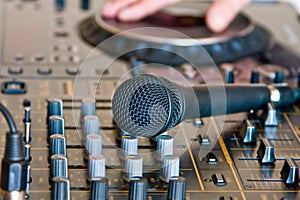 Microphone on soundboard dj photo