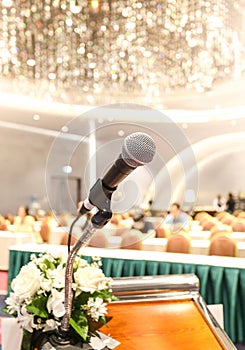 Microphone on the speech podium over the Abstract of conference