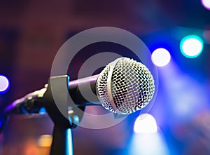 Microphone on stage close-up. Mic. Karaoke, night club, bar. Music concert