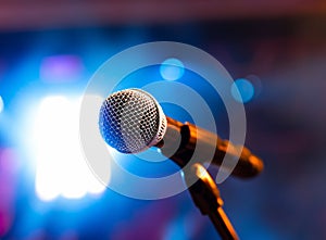 Microphone on stage close-up. Mic. Karaoke, night club, bar. Music concert