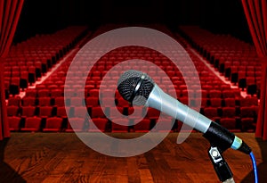 Microphone on Stage with Empty Auditorium Seats