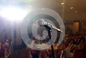 Microphone on stage under spotlight