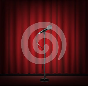 Microphone stand on a stage with red curtain backgrond