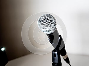 Microphone and stand in white and black