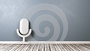 Microphone Symbol on Wooden Floor Against Wall