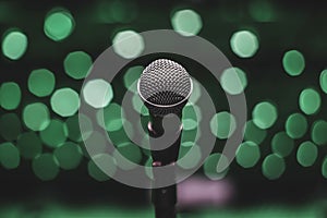 Microphone On The Theater Stage Before The Concert With Green Blurred Lights