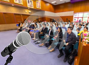 Microphone voice speaker with audiences or students in seminar c