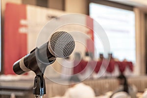 Microphone voice speaker in business seminar, speech presentation, town hall meeting, lecture hall or conference room in corporate