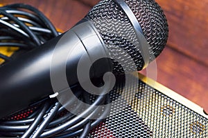Microphone and wire close-up on a blurred background