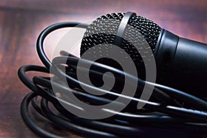 Microphone and wire close-up on a blurred background