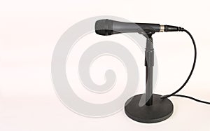 Microphone with wire on a white back ground