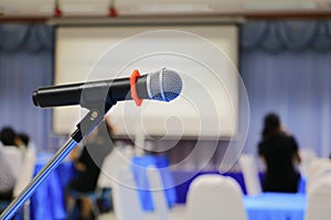 Microphone wireless in a meeting room seminar conference background: Select focus with shallow depth of field